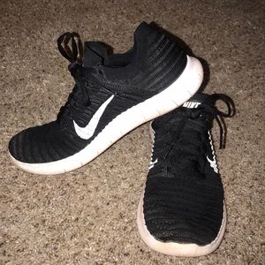Black Nike FlyKnit Sneakers